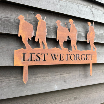 A Rusty Metal Lest We Forget Soldier Scene Garden Decoration