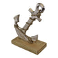 Silver Metal Anchor Ornament On Wooden Base